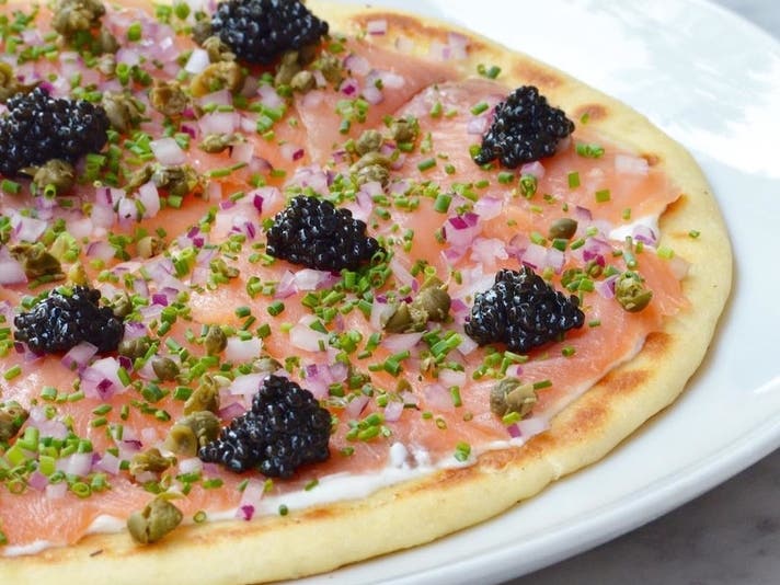 Smoked salmon and caviar flatbread at Petrossian LAX TBIT | Instagramby @petrossianlax